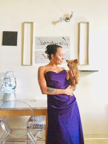 apparel woman holding dog evening dress