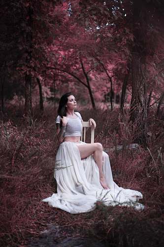 apparel woman sitting on grass fashion