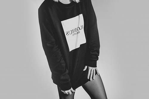 person grayscale woman in long-sleeved shirt black-and-white