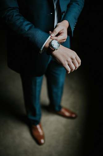 person man holding his black suit people