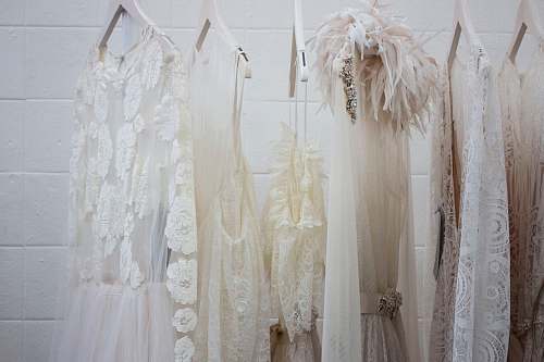 clothes six women's white dresses hanging on hangers wedding