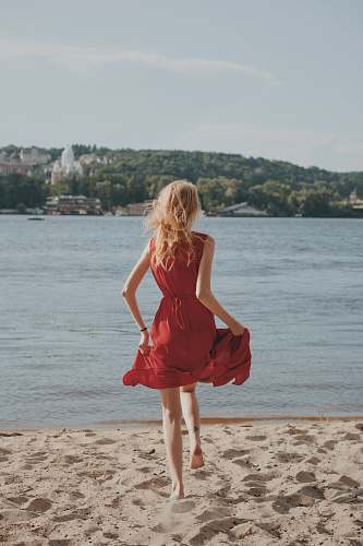 apparel woman running on seashore clothing