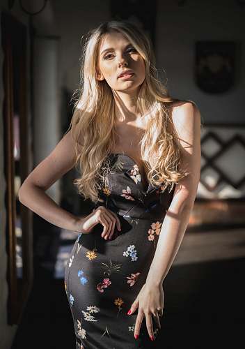 apparel woman wearing black floral dress evening dress