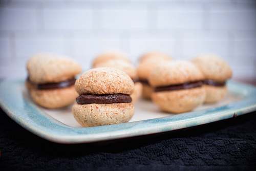 plate closeup photo of macaroons chocolate
