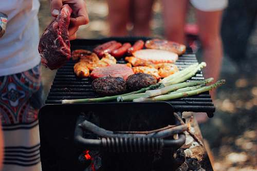 bbq person grilling meat people