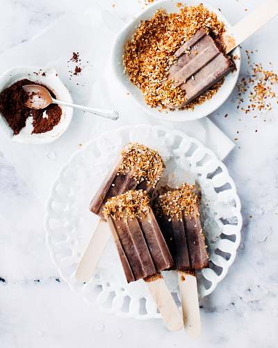 dessert popsicles on white ceramic plate chocolate