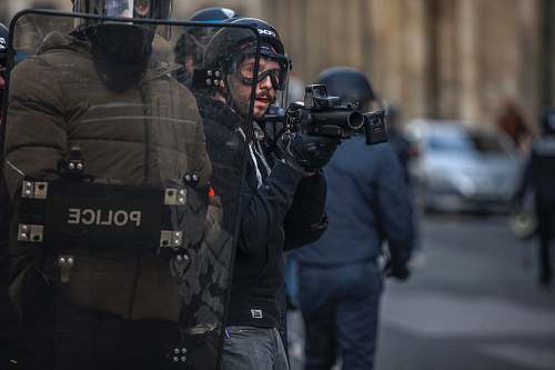 clothing police holding rifle apparel