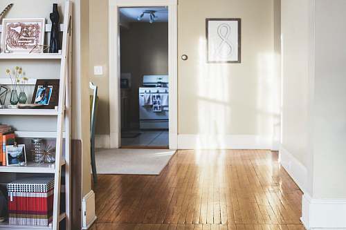 interior photo of white painted room hardwood