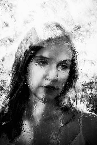 face grayscale photo of woman painting black-and-white