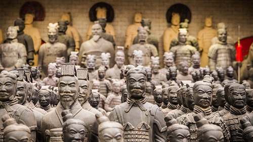 person grey statues lot people