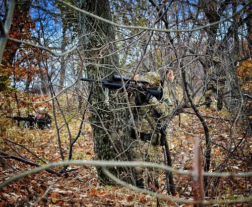 person man aiming rifle military