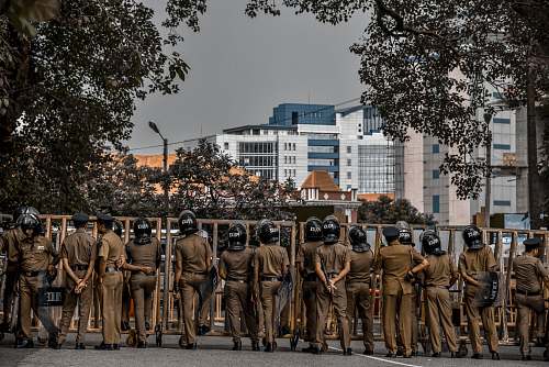 person police men on road military