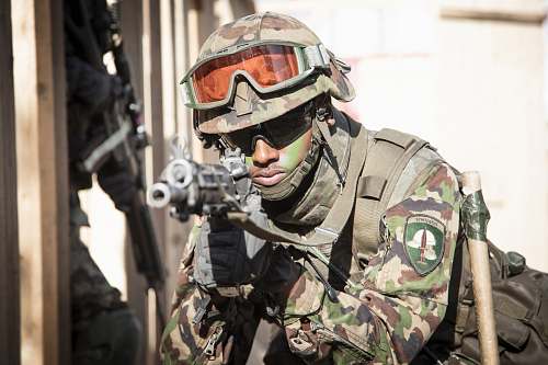 person soldier holding assault rifle people
