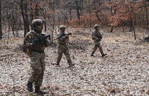 person three soldiers at the forest apparel