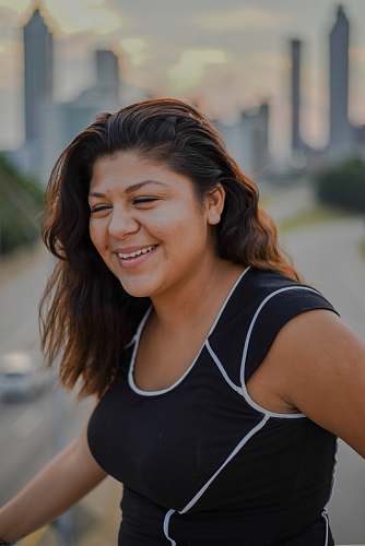 person woman wearing black crew-neck tank dress clothing