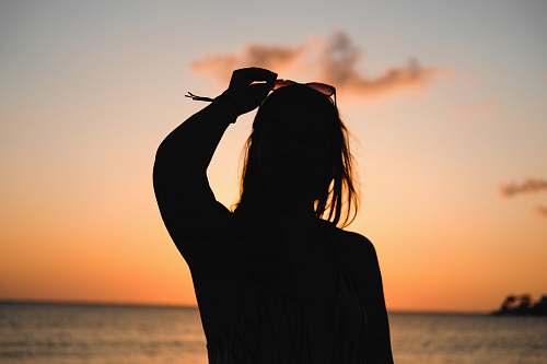 silhouette silhouette of woman at beacnh jamaica