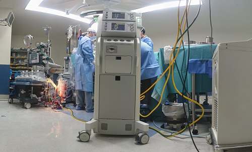 human room with people doing operation people