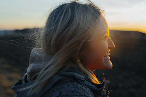 human side view photograph of woman smiling girl