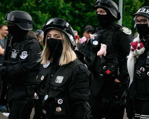 human woman in black uniform police