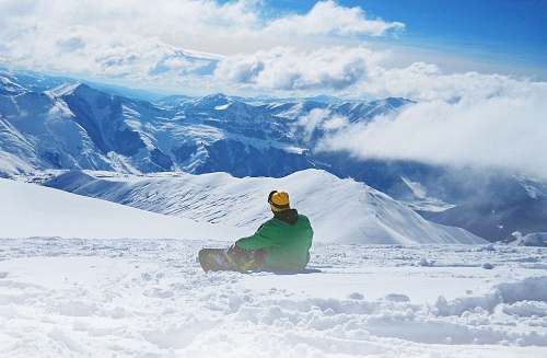 sport man snowboarding on snow during daytime snowboarding
