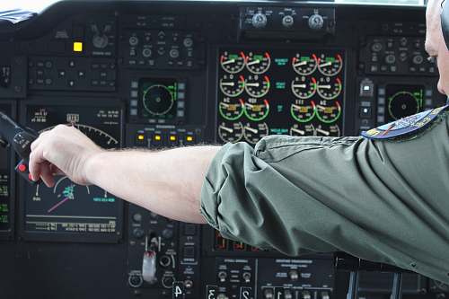 arm photo of pilot calibrating knobs control