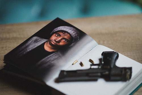 weaponry child's photo and black pistol gun