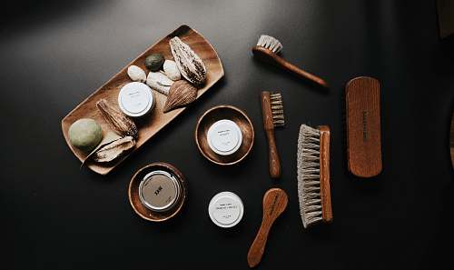 tool hand brushes on brown plate leather care