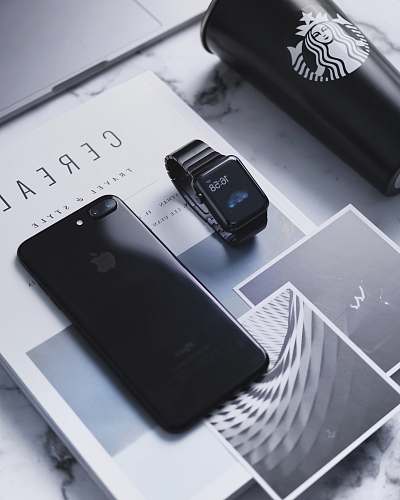iphone space gray iPhone 8 Plus beside space black aluminum case Apple Watch ixelles