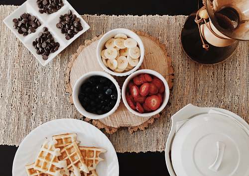 breakfast foods on cups and saucers waffle