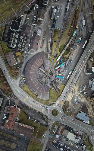 aerial photography of buildings, vehicles, and roads during daytime