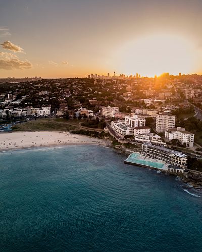 aerial view of hotel resort beside beach