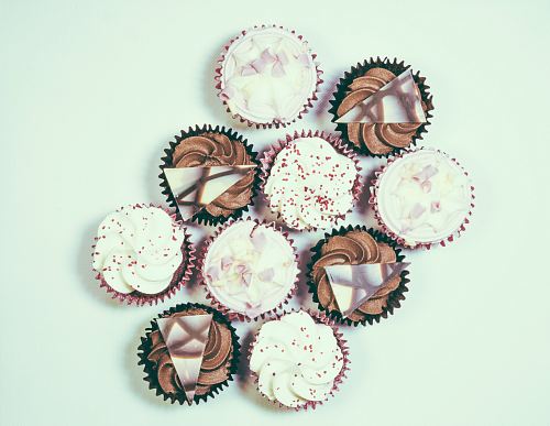 assorted cupcake lot on white surface