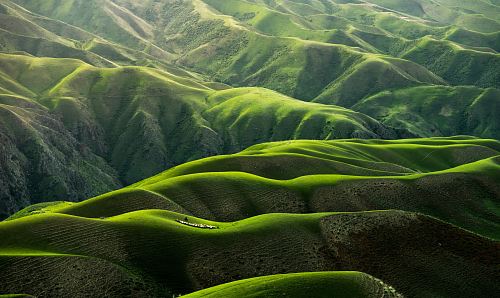 bird's eye view photograph of green mountains