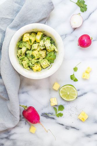bowl of sliced yellow fruit