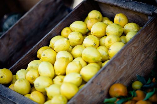 bunch of lemons on box
