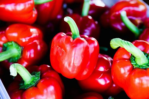 bunch of red bell peppers