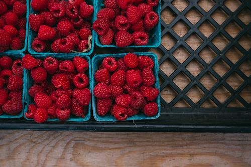 bunch of strawberries in containers