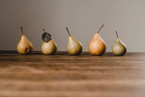 five yellow pear fruits