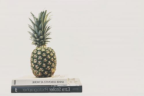 green and yellow pineapple fruit