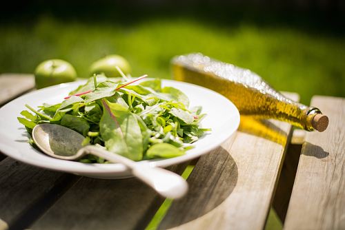 green salad on white plate