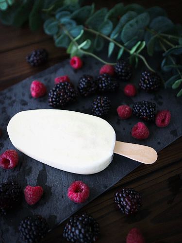 ice cream surrounded with fruits