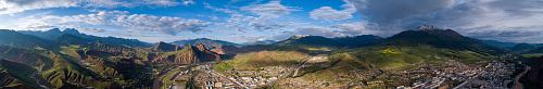 panoramic photography of ruins at the mountain during daytime