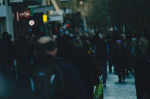 people walking on street near building
