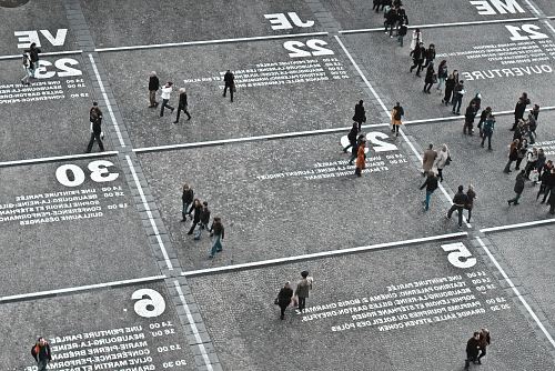 people walking on the road during day time