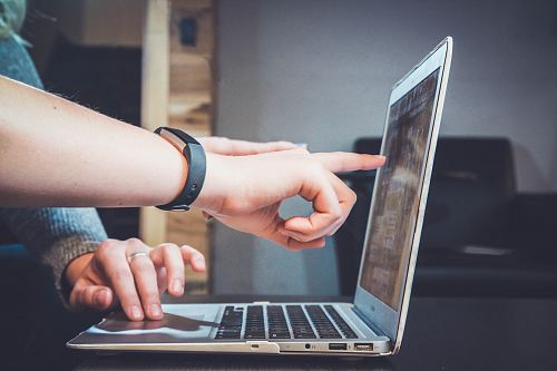person using laptop