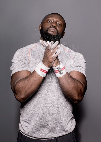 photo of male weight lifter