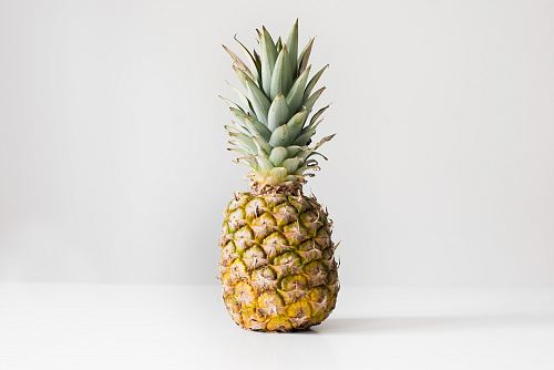pineapple on white surface