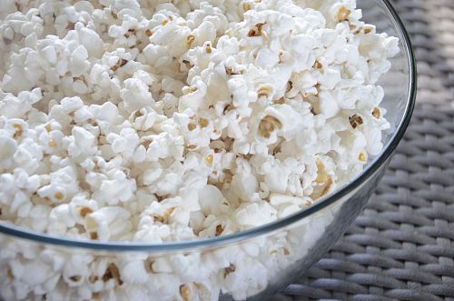 popcorn in clear glass bowl