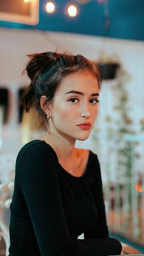 woman in black long-sleeved top