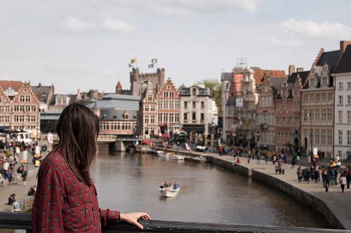woman standing on bridge